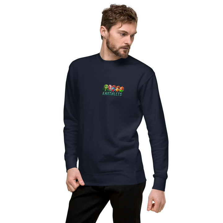 Man wearing Earthlets Unisex Premium Sweatshirt in navy, showcasing colorful Earthlets logo.