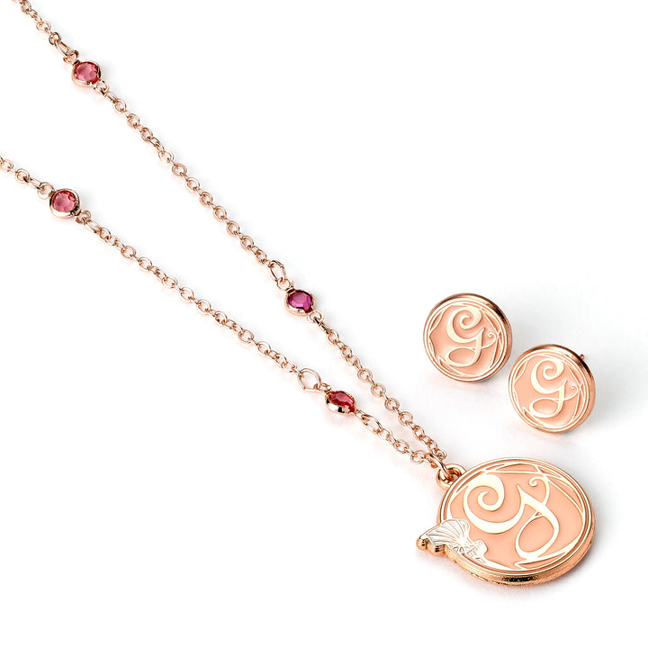 Stunning Wicked Glinda necklace and earrings set featuring rose gold tone and sparkling crystals.