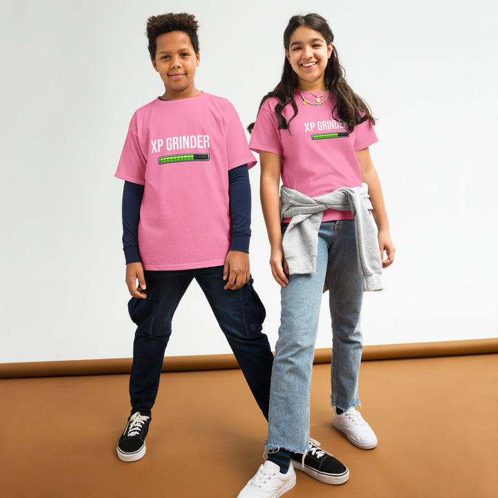 Kids wearing the XP Grinder Youth classic tee in pink, showcasing a stylish and versatile wardrobe staple.
