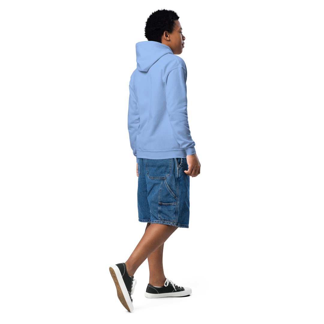 Child wearing an Oddy Pro Youth heavy blend hoodie in blue with denim shorts, showcasing comfort and style.