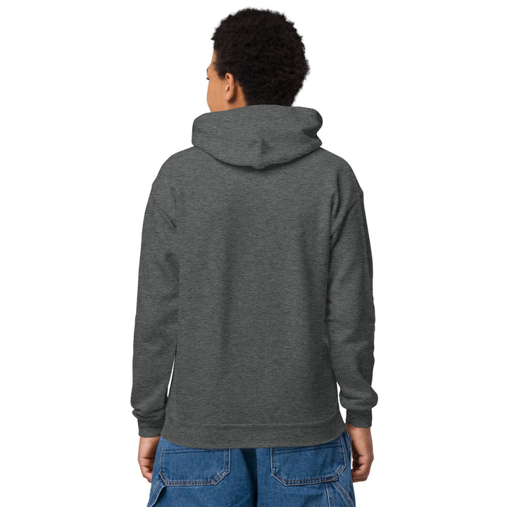 Back view of a child wearing the Oddy Pro Youth heavy blend hoodie in dark gray color.
